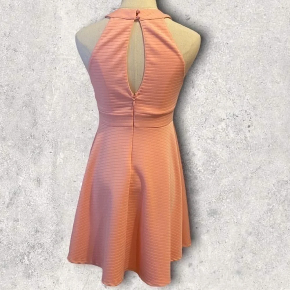 •Altar’d State• Light pink sleeveless‎ dress with partially open back